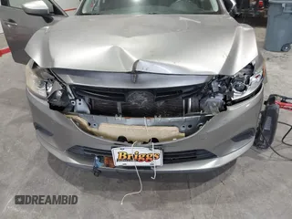 2014 Mazda 6 i Touring with VIN JM1GJ1T51E1106970, listed as a IAAI auction lot 42027350 with 113,756 mi miles and . Bid and sale history available at DreamBid. Image 6.