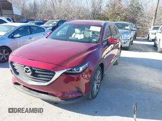 2023 Mazda CX-9 Signature z VIN JM3TCBEY2P0645006, wystawiony jako IAAI lot #41400854 z przebiegiem 19 897 mil mil oraz . Historia ofert i sprzedaży dostępna na DreamBid. Obrazek 17.