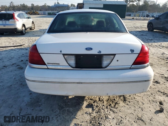 2004 Ford Police Interceptor Base w/3.27 Axle z VIN 2FAFP71W14X175582, wystawiony jako Copart lot #42305225 z przebiegiem 118 216 mil mil oraz Szkoda całkowita • Salvage title. Historia ofert i sprzedaży dostępna na DreamBid. Obrazek 6.