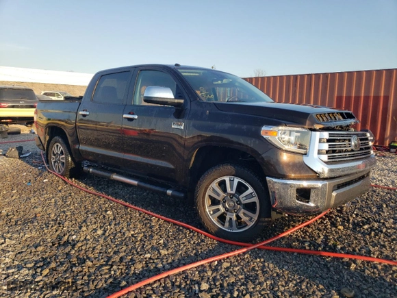 2019 Toyota Tundra 4WD SR5 with VIN 5TFAY5F13KX832503, listed as a Copart auction lot 46536825 with 128,063 mi miles and Salvage Title. Bid and sale history available at carsss.com. Image 4.