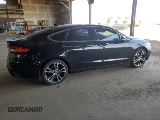 2019 Ford Fusion Titanium with VIN 3FA6P0D90KR116340, listed as a Copart auction lot 60240135 with 190,838 mi miles and Clean title. Bid and sale history available at DreamBid. Image 3.
