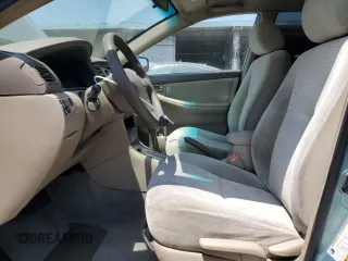 2006 Toyota Corolla CE with VIN 1NXBR32E56Z579489, listed as a Copart auction lot 62107695 with 198,269 mi miles and Salvage title. Bid and sale history available at DreamBid. Image 7.
