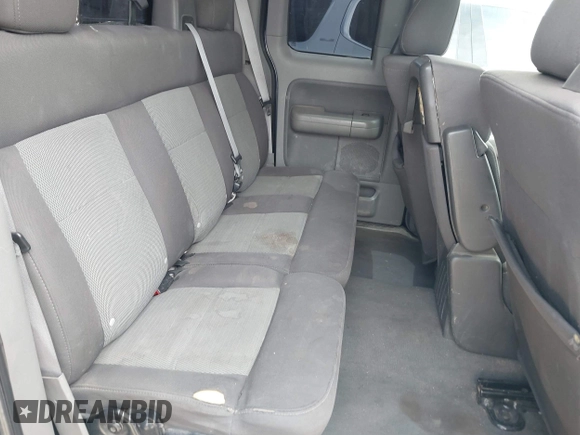 2004 Ford F-150 STX with VIN 1FTRX12W94NC32048, listed as a IAAI auction lot 42012602 with 276,657 mi miles. Bid and sale history available at carsss.com. Image 8.