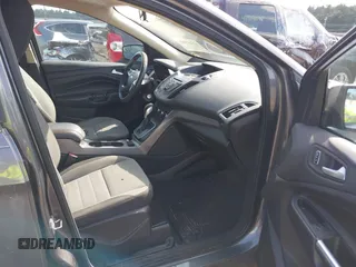 2013 Ford Escape SE z VIN 1FMCU0GX0DUD90385, wystawiony jako IAAI lot #42557540 z przebiegiem 147 529 mil mil oraz . Historia ofert i sprzedaży dostępna na DreamBid. Obrazek 5.