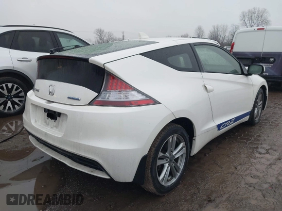 2013 Honda CR-Z with VIN JHMZF1D42DS000230, listed as a IAAI auction lot 41433713 with 128,887 mi miles. Bid and sale history available at carsss.com. Image 4.