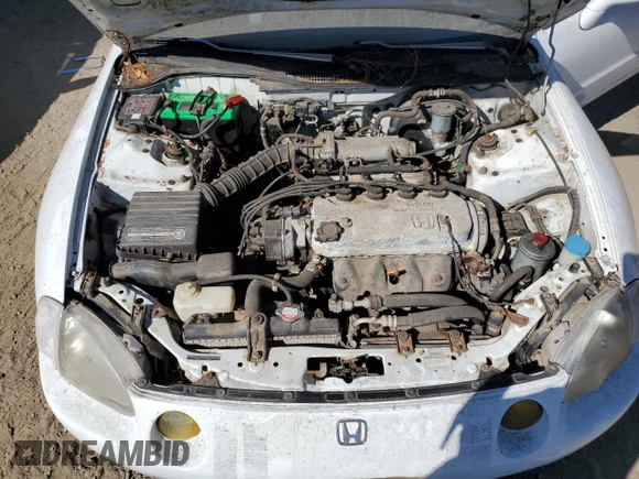 1993 Honda Civic z VIN JHMEG124XPS006408, wystawiony jako Copart lot #69980234 z przebiegiem 251 654 mil mil oraz Czysty tytuł • Clean title. Historia ofert i sprzedaży dostępna na DreamBid. Obrazek 11.