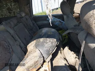 2003 Chevrolet Suburban LT z VIN 3GNEC16Z23G120835, wystawiony jako IAAI lot #41885363 z przebiegiem Nie podano mil oraz . Historia ofert i sprzedaży dostępna na DreamBid. Obrazek 8.