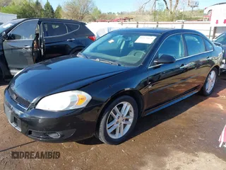 2012 Chevrolet Impala LTZ with VIN 2G1WC5E39C1280827, listed as a IAAI auction lot 41979470 with 153,669 mi miles and . Bid and sale history available at DreamBid. Image 17.