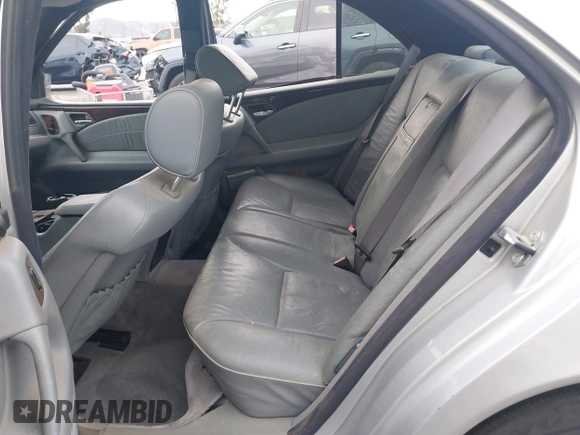 1997 Mercedes-Benz E-Class with VIN WDBJF55FXVJ033553, listed as a IAAI auction lot 41425117 with 280,019 mi miles. Bid and sale history available at carsss.com. Image 8.