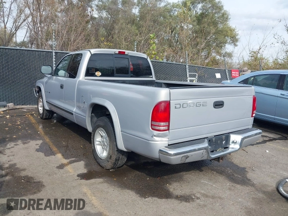 1998 Dodge Dakota SLT with VIN 1B7GL22Y5WS736756, listed as a IAAI auction lot 40687209 with 141,560 mi miles. Bid and sale history available at carsss.com. Image 3.