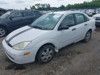2000 Ford Focus SE with VIN 1FAFP3430YW260053, listed as a IAAI auction lot 42166070 with 114,761 mi miles and . Bid and sale history available at carsss.com. Image 2.