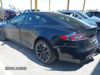 2021 Tesla Model S Long Range z VIN 5YJSA1E54MF429360, wystawiony jako IAAI lot #42662440 z przebiegiem 36 395 mil mil oraz . Historia ofert i sprzedaży dostępna na DreamBid. Obrazek 3.