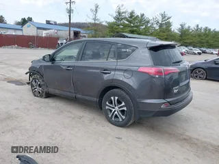 2018 Toyota RAV4 LE with VIN JTMBFREV4JJ742428, listed as a IAAI auction lot 41912813 with 114,159 mi miles. Bid and sale history available at carsss.com. Image 3.