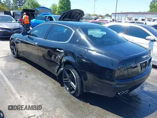 2006 Maserati Quattroporte z VIN ZAMCE39A660024352, wystawiony jako IAAI lot #42050460 z przebiegiem 57 715 mil mil oraz . Historia ofert i sprzedaży dostępna na DreamBid. Obrazek 3.