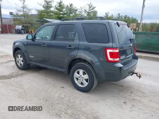 2008 Ford Escape XLT with VIN 1FMCU93138KE30644, listed as a IAAI auction lot 41881704 with 120,402 mi miles. Bid and sale history available at carsss.com. Image 3.