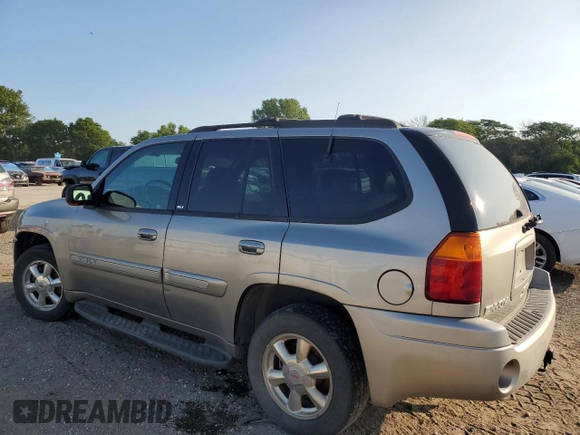 2002 GMC Envoy SLT with VIN 1GKDT13S322420861, listed as a Copart auction lot 63408164 with 250,167 mi miles and Salvage Title. Bid and sale history available at DreamBid. Image 2.