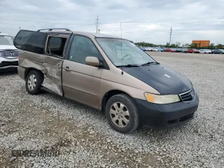 2003 Honda Odyssey EX z VIN 5FNRL186X3B152340, wystawiony jako Copart lot #57883455 z przebiegiem 214 008 mil mil oraz Szkoda całkowita • Salvage title. Historia ofert i sprzedaży dostępna na DreamBid. Obrazek 4.