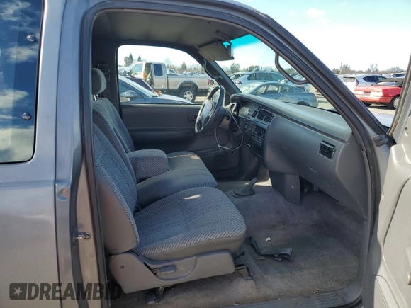 1995 Toyota T100 z VIN JT4VD22E1S0016497, wystawiony jako Copart lot #44385205 z przebiegiem 190 432 mil mil oraz Szkoda całkowita • Salvage title. Historia ofert i sprzedaży dostępna na DreamBid. Obrazek 10.