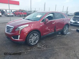 2018 Cadillac XT5 Premium Luxury FWD z VIN 1GYKNERS2JZ242842, wystawiony jako IAAI lot #42297159 z przebiegiem 72 008 mil mil oraz . Historia ofert i sprzedaży dostępna na DreamBid. Obrazek 2.