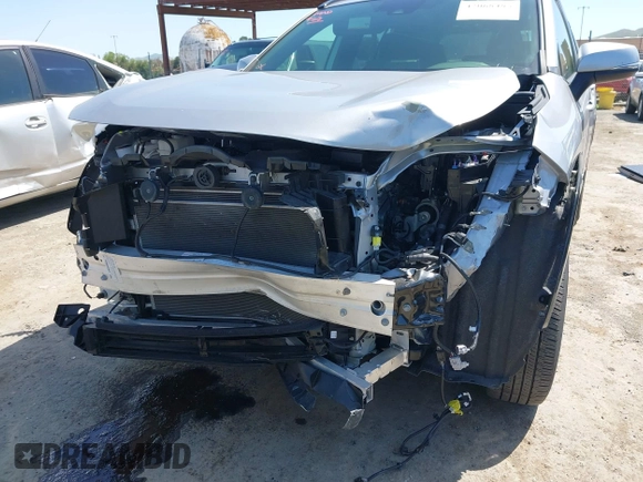 2022 Toyota RAV4 Hybrid SE with VIN JTM16RFV7ND062263, listed as a IAAI auction lot 42068485 with 25,282 mi miles and . Bid and sale history available at DreamBid. Image 6.