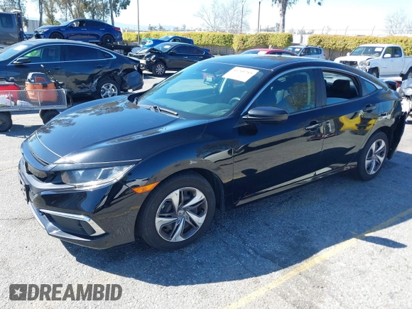 2020 Honda Civic LX z VIN 19XFC2F6XLE212683, wystawiony jako IAAI lot #41745743 z przebiegiem 81 553 mil mil oraz . Historia ofert i sprzedaży dostępna na DreamBid. Obrazek 18.