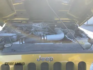 2008 Jeep Wrangler Rubicon с VIN 1J4GA64198L518646, выставлен на аукционе Copart как лот 82381084 с пробегом Не указан миль и Списание • Salvage title. История ставок и продаж доступна на DreamBid. Изображение 11.