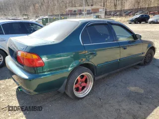 2000 Honda Civic EX with VIN JHMEJ8642YS004030, listed as a Copart auction lot 50002815 with 152,564 mi miles and Salvage Title. Bid and sale history available at carsss.com. Image 3.