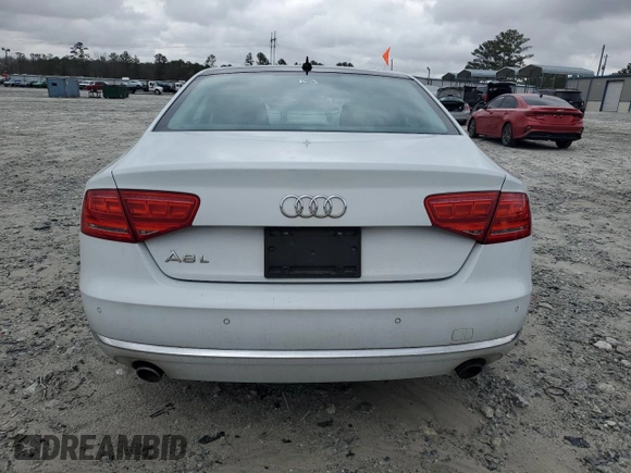 2014 Audi A8 3.0T z VIN WAURGAFD3EN003758, wystawiony jako Copart lot #47636885 z przebiegiem 166 990 mil mil oraz Szkody całkowita. Historia ofert i sprzedaży dostępna na DreamBid. Obrazek 6.