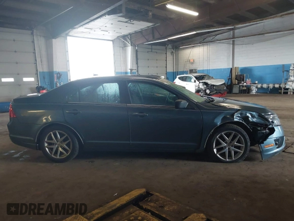 2012 Ford Fusion SEL z VIN 3FAHP0JG1CR352069, wystawiony jako IAAI lot #42182795 z przebiegiem 131 554 mil mil oraz . Historia ofert i sprzedaży dostępna na DreamBid. Obrazek 13.