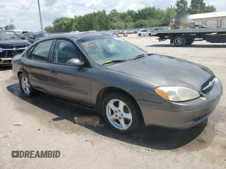 2002 Ford Taurus SES Standard with VIN 1FAFP55UX2A166740, listed as a Copart auction lot 61257665 with 170,448 mi miles and Salvage title. Bid and sale history available at DreamBid. Image 4.