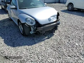 2015 Volkswagen Beetle 1.8T with VIN 3VW517AT8FM810709, listed as a Copart auction lot 48065314 with 61,924 mi miles and Salvage title. Bid and sale history available at DreamBid. Image 12.