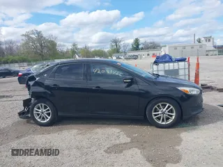 2015 Ford Focus SE with VIN 1FADP3F2XFL313187, listed as a IAAI auction lot 42083426 with 96,562 mi miles and . Bid and sale history available at carsss.com. Image 14.