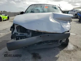 1997 Ford Escort LX with VIN 1FALP13P2VW282739, listed as a Copart auction lot 45139215 with 105,095 mi miles and Salvage Title. Bid and sale history available at carsss.com. Image 5.
