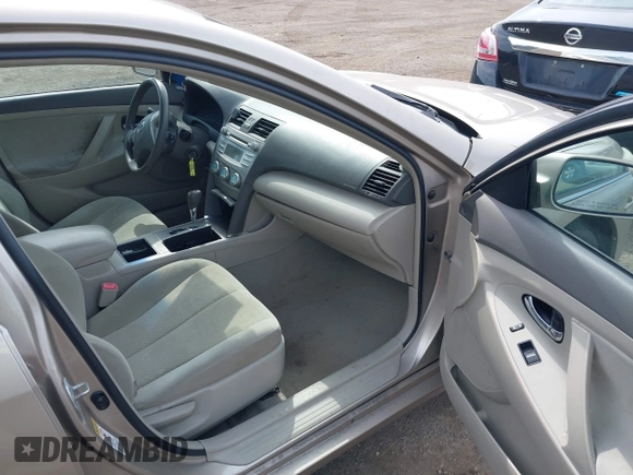 2009 Toyota Camry with VIN 4T1BE46K99U834926, listed as a IAAI auction lot 41853947 with 214,044 mi miles. Bid and sale history available at carsss.com. Image 5.