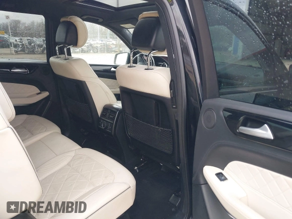 2017 Mercedes-Benz GLS 550 z VIN 4JGDF7DE3HA952393, wystawiony jako IAAI lot #41486489 z przebiegiem 86 350 mil mil oraz . Historia ofert i sprzedaży dostępna na DreamBid. Obrazek 8.