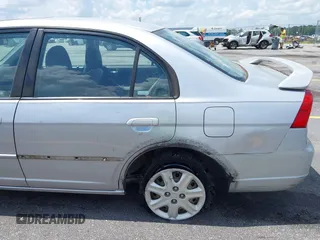2003 Honda Civic EX with VIN 1HGES26753L007546, listed as a IAAI auction lot 42169138 with 151,688 mi miles. Bid and sale history available at carsss.com. Image 14.