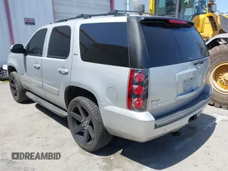 2010 GMC Yukon SLT with VIN 1GKUCCE00AR255901, listed as a IAAI auction lot 41967877 with 195,969 mi miles. Bid and sale history available at carsss.com. Image 3.