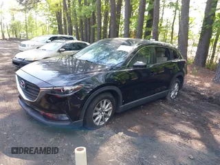2016 Mazda CX-9 Sport with VIN JM3TCABY8G0112981, listed as a IAAI auction lot 42093389 with 106,384 mi miles. Bid and sale history available at carsss.com. Image 18.