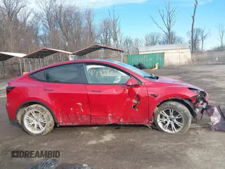 2023 Tesla Model Y Long Range with VIN 7SAYGDEE7PF672887, listed as a IAAI auction lot 41744398 with Not Provided miles. Bid and sale history available at carsss.com. Image 12.