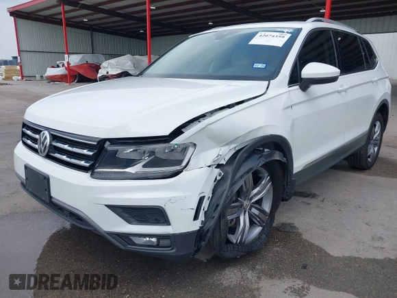 2020 Volkswagen Tiguan SE z VIN 3VV3B7AX4LM032609, wystawiony jako IAAI lot #42074359 z przebiegiem 52 404 mil mil oraz . Historia ofert i sprzedaży dostępna na DreamBid. Obrazek 6.