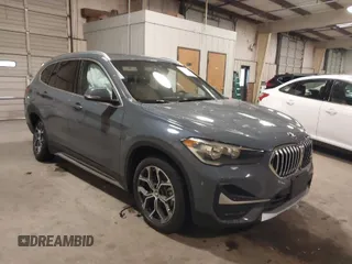 2022 BMW X1 xDrive28i with VIN WBXJG9C0XN5V02558, listed as a IAAI auction lot 41522148 with 41,801 mi miles. Bid and sale history available at carsss.com. Image 1.