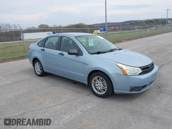 2009 Ford Focus SE with VIN 1FAHP35N59W157060, listed as a IAAI auction lot 41871757 with 141,558 mi miles. Bid and sale history available at carsss.com. Image 1.