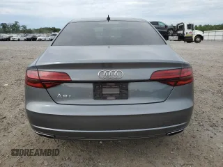 2017 Audi A8 z VIN WAU44AFD1HN009176, wystawiony jako Copart lot #57647675 z przebiegiem 94 317 mil mil oraz Szkoda całkowita • Salvage title. Historia ofert i sprzedaży dostępna na DreamBid. Obrazek 6.