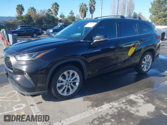 2021 Toyota Highlander Hybrid Limited with VIN 5TDYARAH8MS006883, listed as a IAAI auction lot 41507332 with 169,210 mi miles and . Bid and sale history available at DreamBid. Image 17.