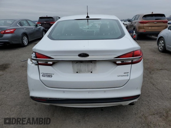 2018 Ford Fusion Hybrid SE with VIN 3FA6P0LU7JR234907, listed as a Copart auction lot 42498623 with 73,769 mi miles. Bid and sale history available at carsss.com. Image 6.