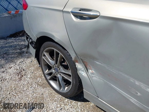 2015 Ford Fusion Titanium with VIN 3FA6P0D91FR236699, listed as a IAAI auction lot 41977478 with 203,394 mi miles. Bid and sale history available at carsss.com. Image 17.
