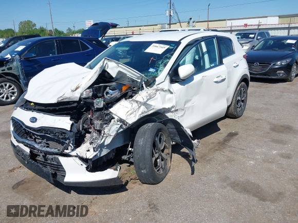 2021 Kia Sportage LX with VIN KNDPM3AC8M7932425, listed as a IAAI auction lot 39067549 with 56,841 mi miles. Bid and sale history available at carsss.com. Image 2.