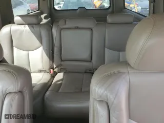 2004 GMC Yukon XL Denali with VIN 1GKFK66U84J258384, listed as a Copart auction lot 76179964 with 0 mi miles and Salvage Title. Bid and sale history available at carsss.com. Image 10.