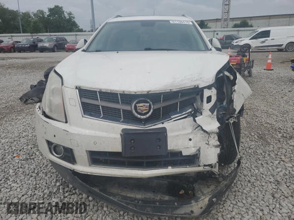 2012 Cadillac SRX Performance Collection z VIN 3GYFNBE32CS615988, wystawiony jako Copart lot #61198415 z przebiegiem 156 135 mil mil oraz Szkoda całkowita • Salvage title. Historia ofert i sprzedaży dostępna na DreamBid. Obrazek 5.