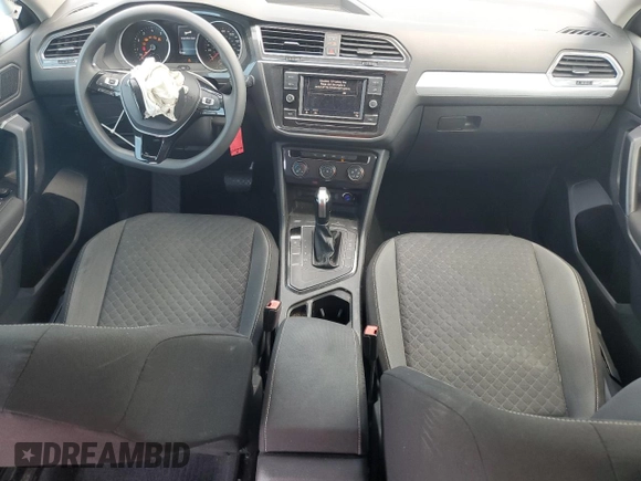 2021 Volkswagen Tiguan S with VIN 3VV1B7AX9MM023655, listed as a Copart auction lot 64159445 with 55,795 mi miles and Salvage title. Bid and sale history available at DreamBid. Image 8.